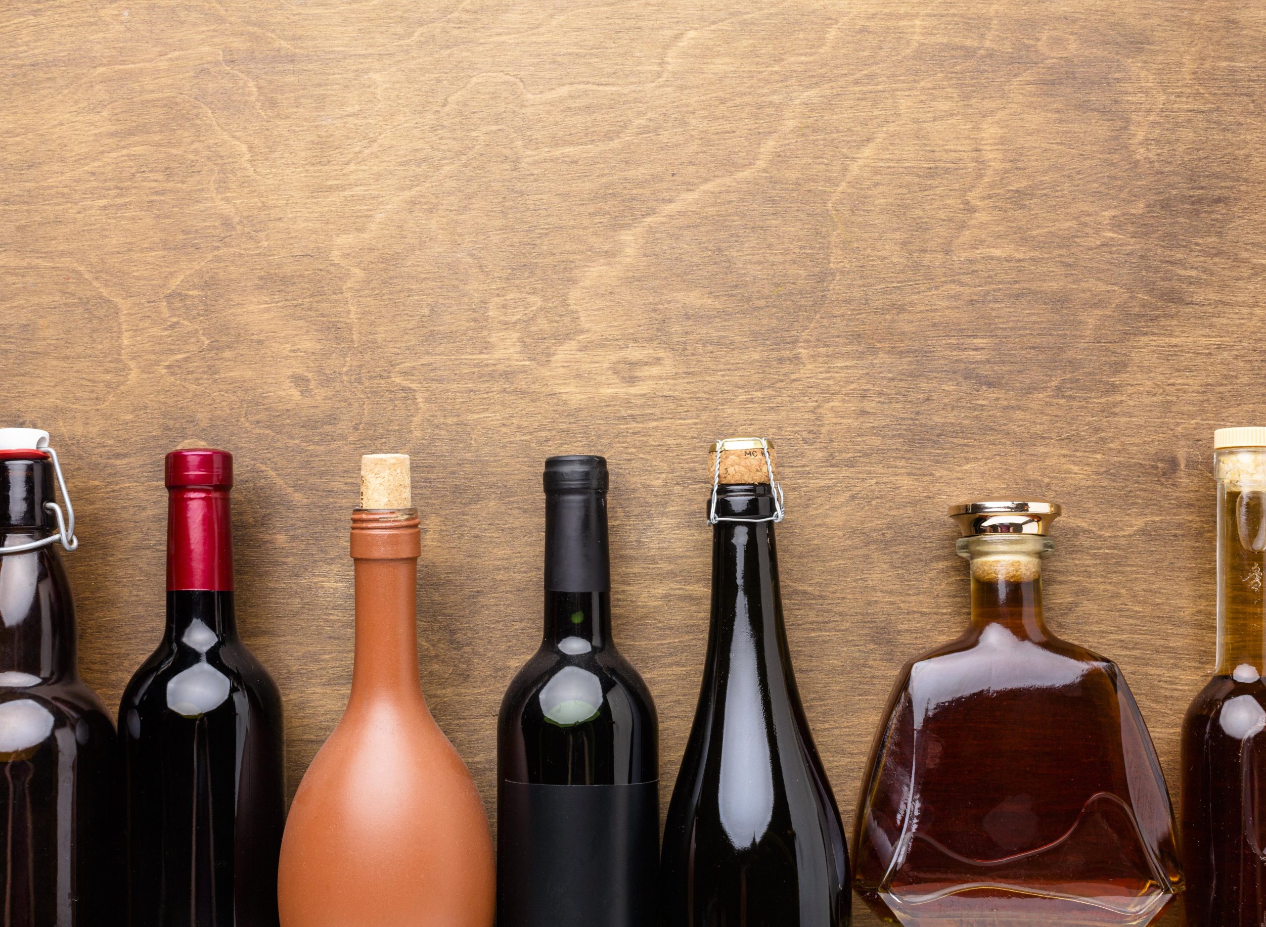 top view mix alcohol bottles scaled